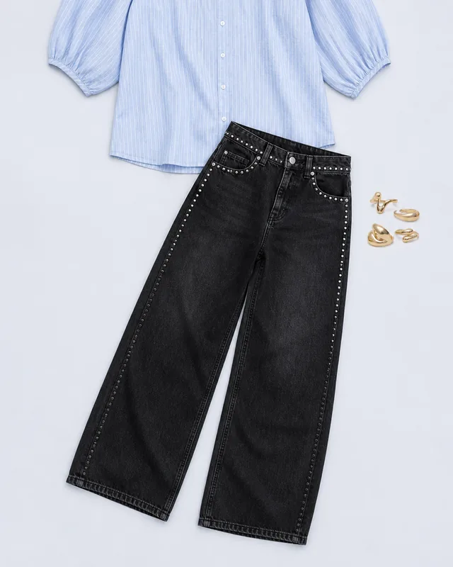 Pinstripe Linen Ring Receipt button up shirt outfit flatlay with Pinstripe Linen Look Button Up Shirt, Quincy Studded Low Rise Baggy Jeans, Assorted Abstract Ring Pack