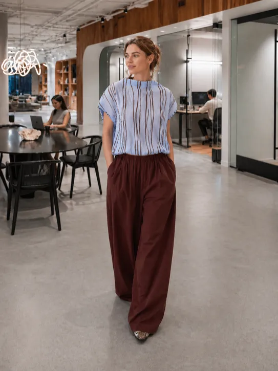 Effortless Office Movement outfit featuring a blue striped top and brown pants