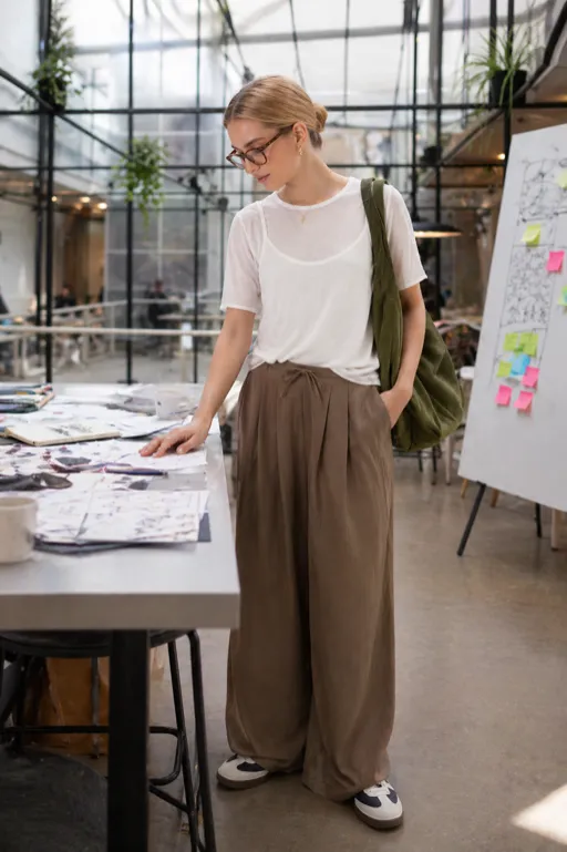 Effortless Studio Ease outfit featuring a white blouse and denim shirt