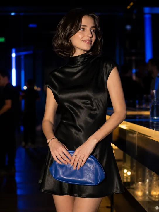 Midnight Satin Glow party outfit featuring a black satin dress