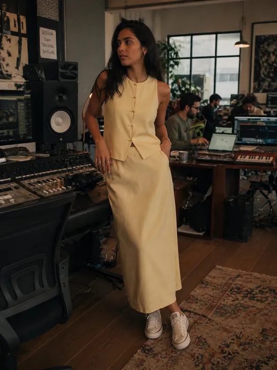 Soft Tailoring Meets outfit featuring a yellow linen set and white sneakers