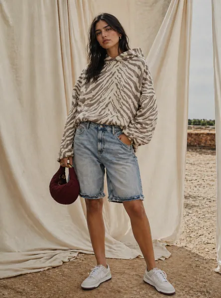 Soft Desert Spring outfit featuring zebra print hoodie and denim shorts