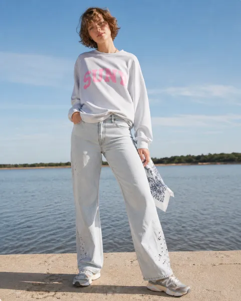 Relaxed Coastal Streetwear outfit featuring mint top and denim jeans
