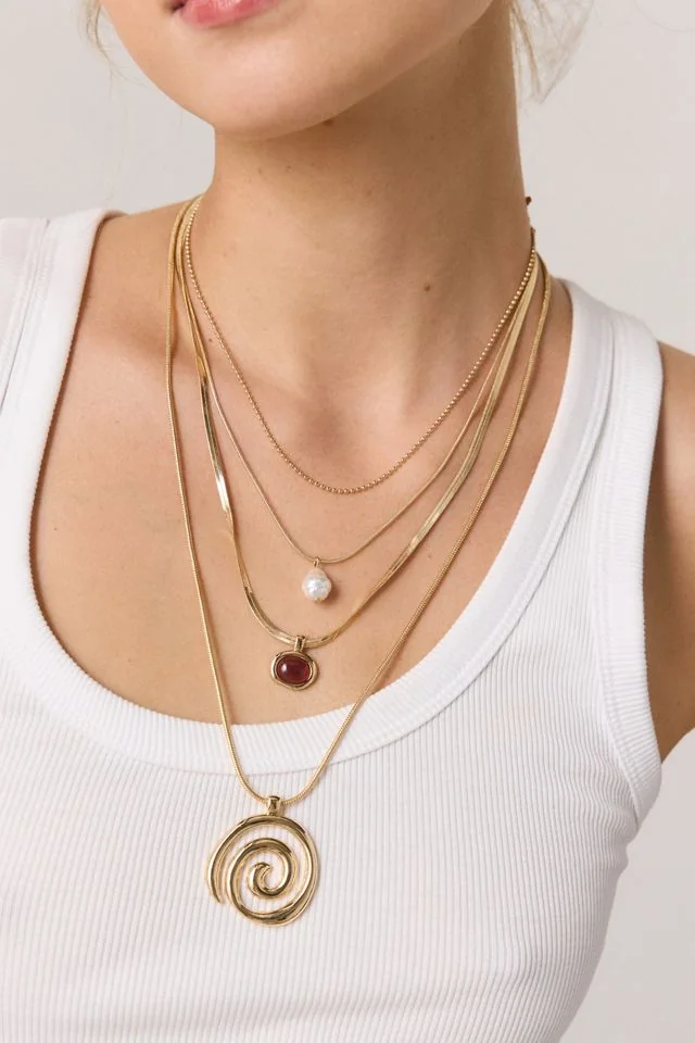 Saturn Swirl Layering Necklace Stack